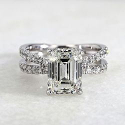 Half Eternity Emerald Cut Crossover Engagement Ring