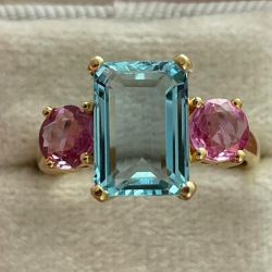 Three Stone Golden Emerald Cut Blue Topaz Engagement Ring