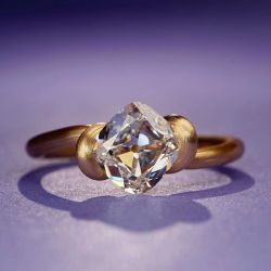 Unique Golden Solitaire Cushion Cut Engagement Ring