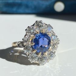 Two Tone Halo Oval Cut Blue Sapphire Engagement Ring