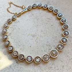 Two Tone Concentric Circle Design Round Cut Tennis Bracelet