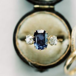 Golden Three Stone Cushion Cut Blue Sapphire Engagement Ring