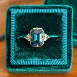 Three Stone Emerald Cut Blue Sapphire Engagement Ring