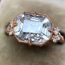 Vintage Rose Gold Emerald Cut White Sapphire Engagement Ring