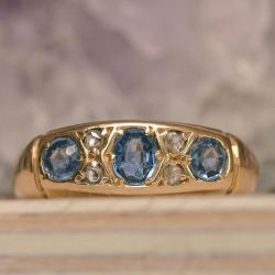 Vintage Blue Sapphire Oval & Round Cut Golden Engagement Ring