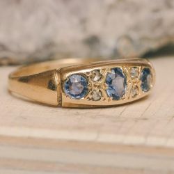 Vintage Three Stone Blue Sapphire Oval & Round Cut Golden Engagement Ring
