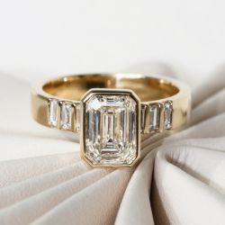 Golden Bezel White Sapphire Emerald Cut Engagement Ring For Women