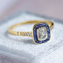 Golden Halo Round Cut White & Blue Sapphire Engagement Ring For Women
