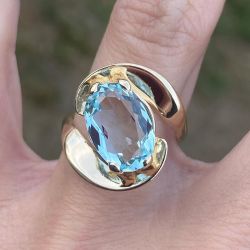 Unique Golden Solitaire Aquamarine Oval Cut Engagement Ring