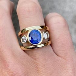 Golden Three Stone Blue Sapphire Oval Cut Engagement Ring