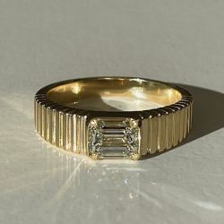 Golden Solitaire Emerald Cut White Sapphire Ribbed Engagement Ring