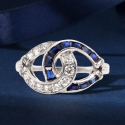 Art Deco Round & Baguette Cut White & Blue Sapphire Engagement Ring