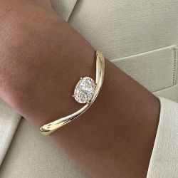 Elegant Golden Solitaire Oval Cut White Sapphire Bangle Bracelet For Women