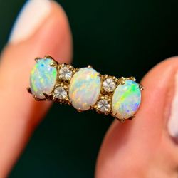 Golden Three Stone White Opal & Sapphire Oval Cut Engagement Ring