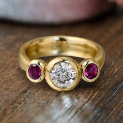 Golden Bezel Round & Oval Cut White & Ruby Sapphire Three Stone Engagement Ring 