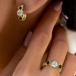 Bezel Round & Oval Cut White & Blue Sapphire Three Stone Engagement Ring & Hoop Earrings Set