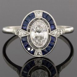 Halo Oval & Baguette Cut White & Blue Sapphire Engagement Ring