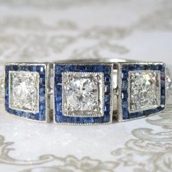 Halo Round & Baguette Cut White & Blue Sapphire Art Deco Engagement Ring