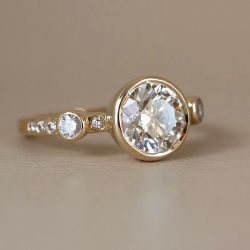 Golden Bezel Round Cut White Sapphire Engagement Ring