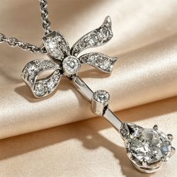 Bow Design Round Cut White Sapphire Pendant Necklace