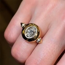 Golden Bezel Oval Cut White Sapphire Engagement Ring