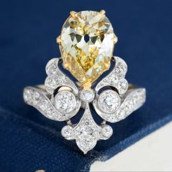 Two Tone Pear & Round Cut Yellow & White Sapphire Engagement Ring