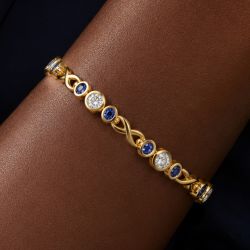 Golden Bezel Round & Oval Cut White & Blue Sapphire Tennis Bracelet