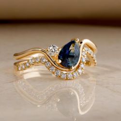 Golden Twist Pear & Round Cut Blue & White Sapphire Engagement Ring Sets