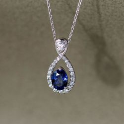 Halo Oval & Round Cut Blue & White Sapphire Infinity Pendant Necklace