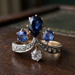 Two Tone Pear & Round Cut Blue & White Sapphire Engagement Ring