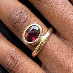 Golden Bezel Solitaire Oval Cut Garnet Sapphire Engagement Ring