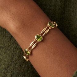 Golden Bezel Oval Cut Peridot Sapphire Tennis Bracelet