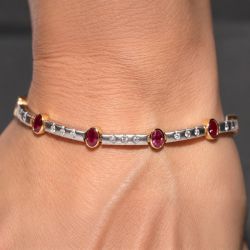 Two Tone Oval & Round Cut Ruby & White Sapphire Tennis Bracelet