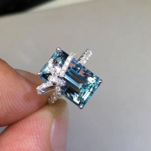 Bowknot Design Blue Emerald Cut Engagement Ring
