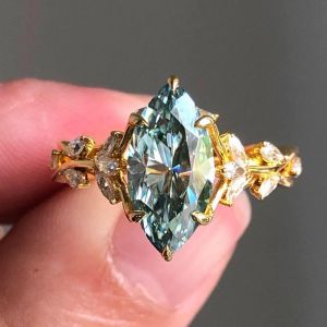 Vine Design Golden Marquise Cut Blue Topaz Engagement Ring