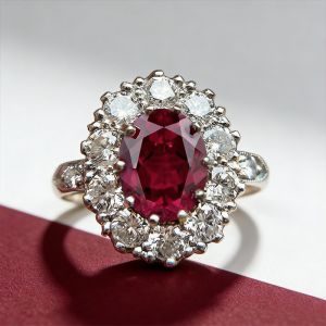 Two Tone Halo Oval Cut Ruby & White Sapphire Engagement Ring