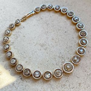 Two Tone Concentric Circle Design Round Cut Tennis Bracelet