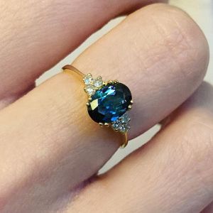 Golden Oval Cut Blue & White Sapphire Engagement Ring