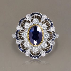 Art Deco Two Tone Halo Oval Cut Blue Sapphire Engagement Ring