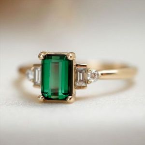 Art Deco Golden Emerald Cut Emerald Sapphire Engagement Ring