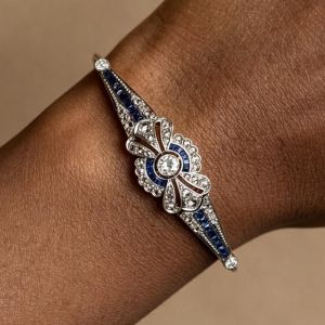Two Tone Round Cut White & Blue Sapphire Tennis Bracelet