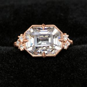 Vintage Rose Gold Emerald Cut White Sapphire Engagement Ring