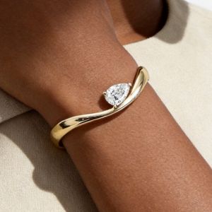 Elegant Golden Solitaire Pear Cut White Sapphire Bangle Bracelet For Women