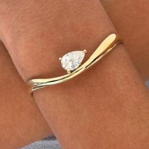 Elegant Golden Solitaire Pear Cut White Sapphire Bangle Bracelet For Women