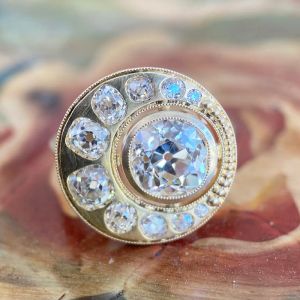 Art Deco Golden Halo Round Cut White Sapphire Engagement Ring 