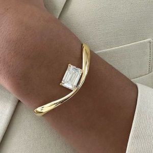 Elegant Golden Solitaire Emerald Cut White Sapphire Bangle Bracelet For Women