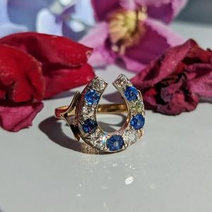 Horseshoe Design Blue & White Sapphire Round Split Shank Engagement Ring