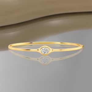 Golden Solitaire Oval Cut White Sapphire Bangle Bracelet (1.25 CT. TW.)