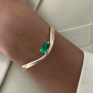 Golden Solitaire Pear Cut Emerald Sapphire Bangle Bracelet