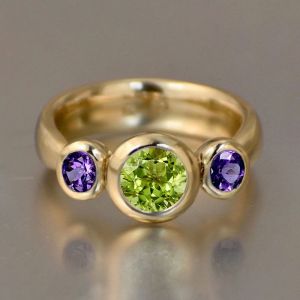 Three Stone Round & Oval Cut Peridot & Amethyst Sapphire Engagement Ring